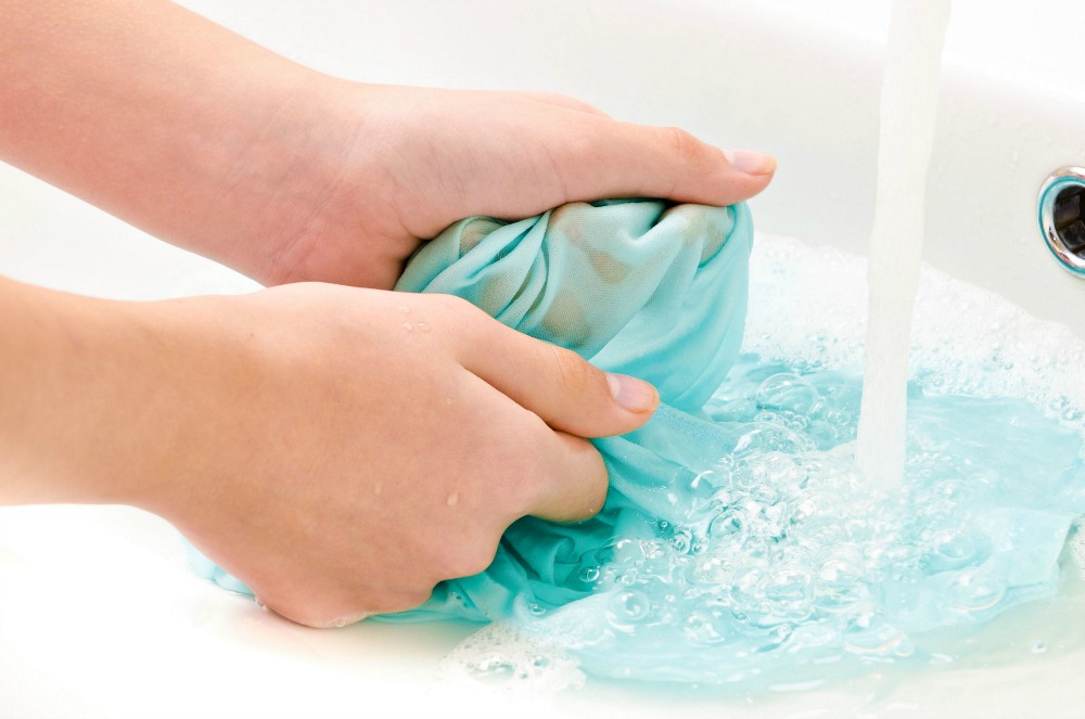 Hand Washing Laundry in a Bucket